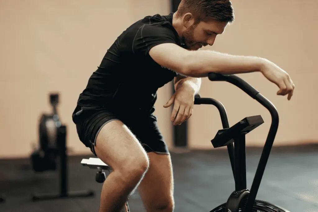 Exhausted cyclist taking a break
